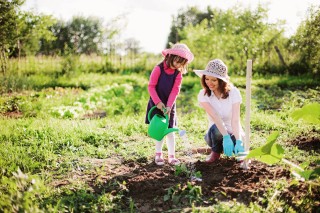 Mother and daughter gardening