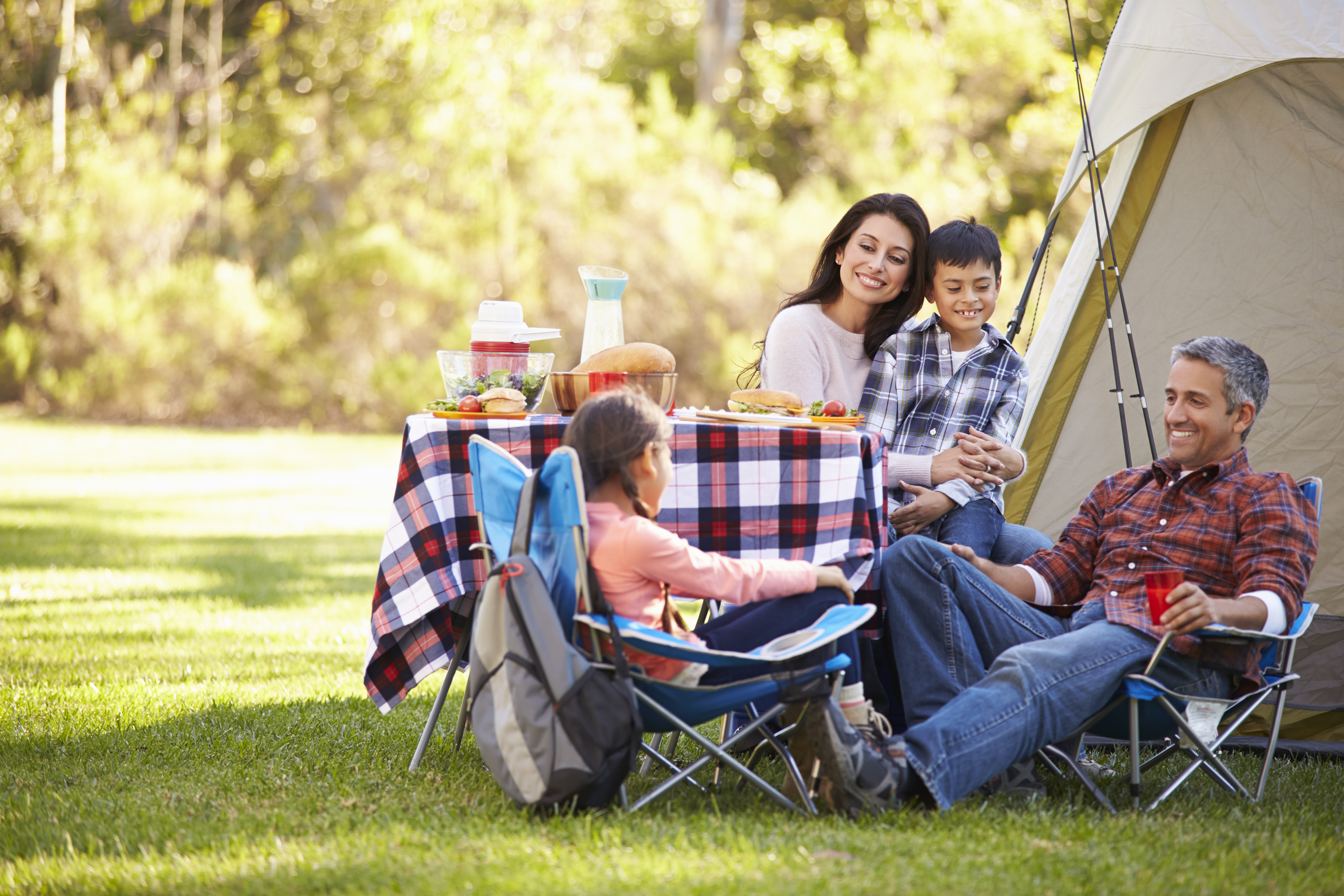 priority health personal wellness camping in michigan family outside tent