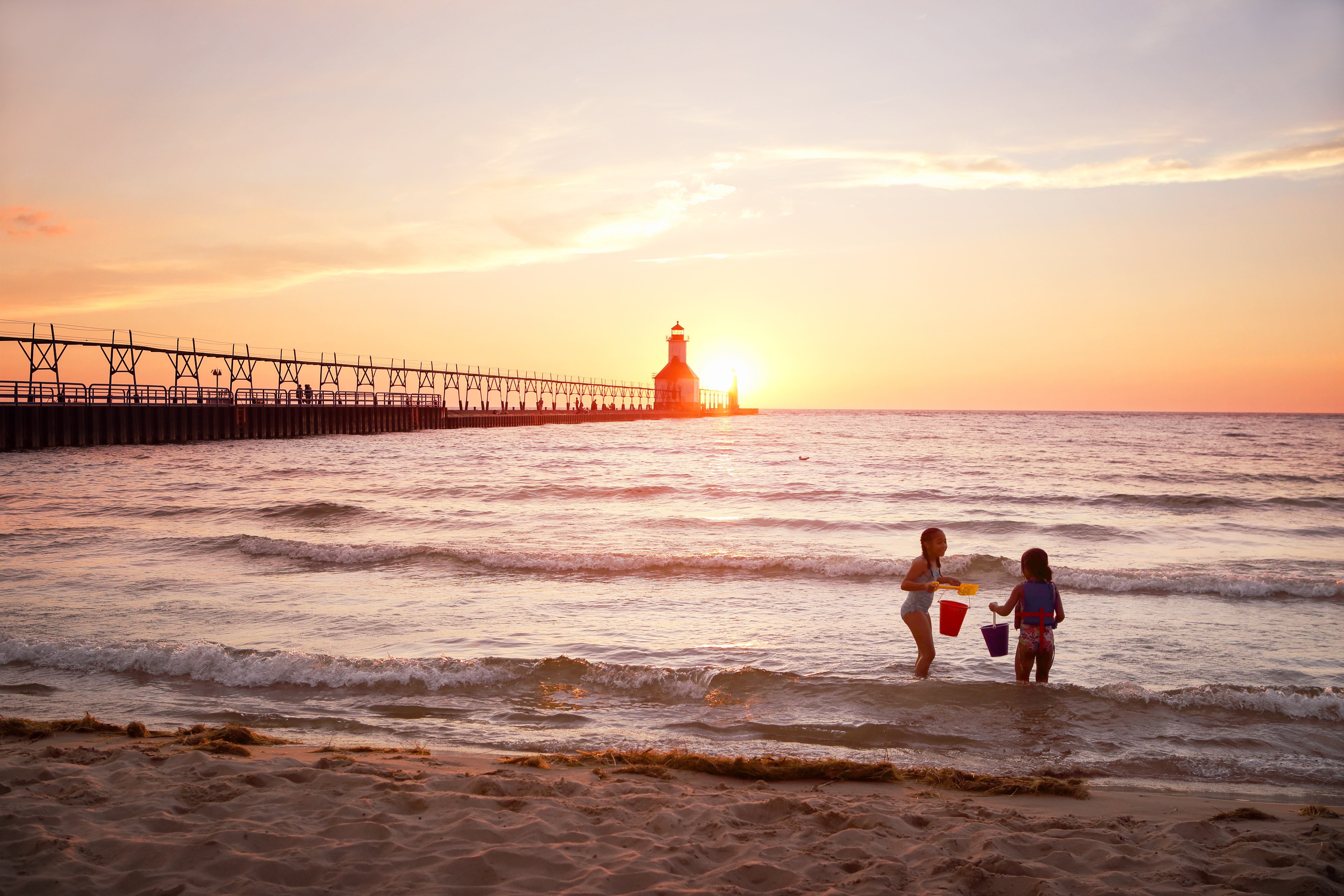 priority health personal wellness water safety kids play at lake mi beach