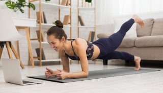ThinkHealth personal wellness woman doing yoga