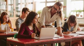 ThinkHealth building purpose woman helping student 