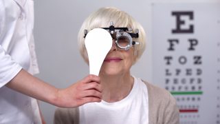 woman getting vision exam