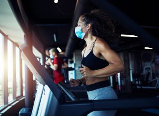 ThinkHealth personal wellness gym safety during covid woman running in mask