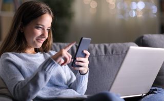 ThinkHealth personal wellness reducing screen time woman on phone and computer