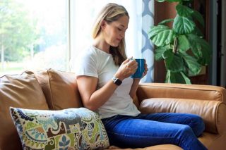 Woman sipping coffee