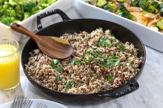 wild rice in a pan with a spatula